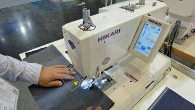 Mesin Lubang Kancing Eyelet Terkomputerisasi